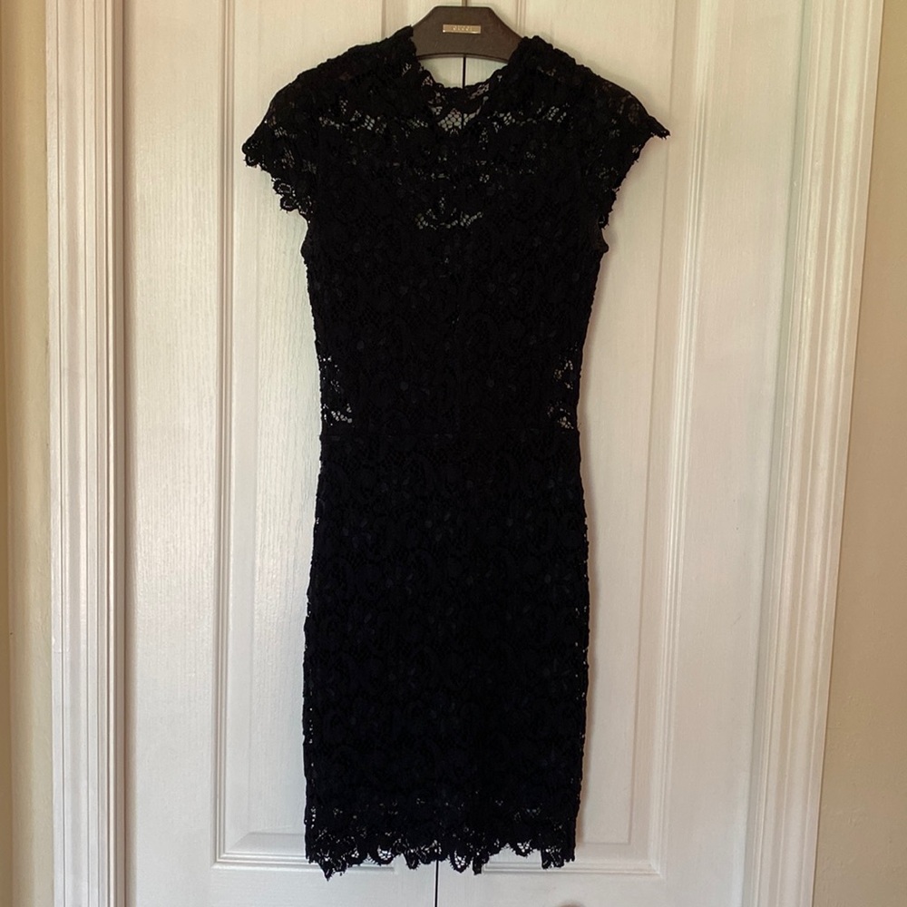 Nightcap Classic and sexy little black mini dress in lace. Size small.